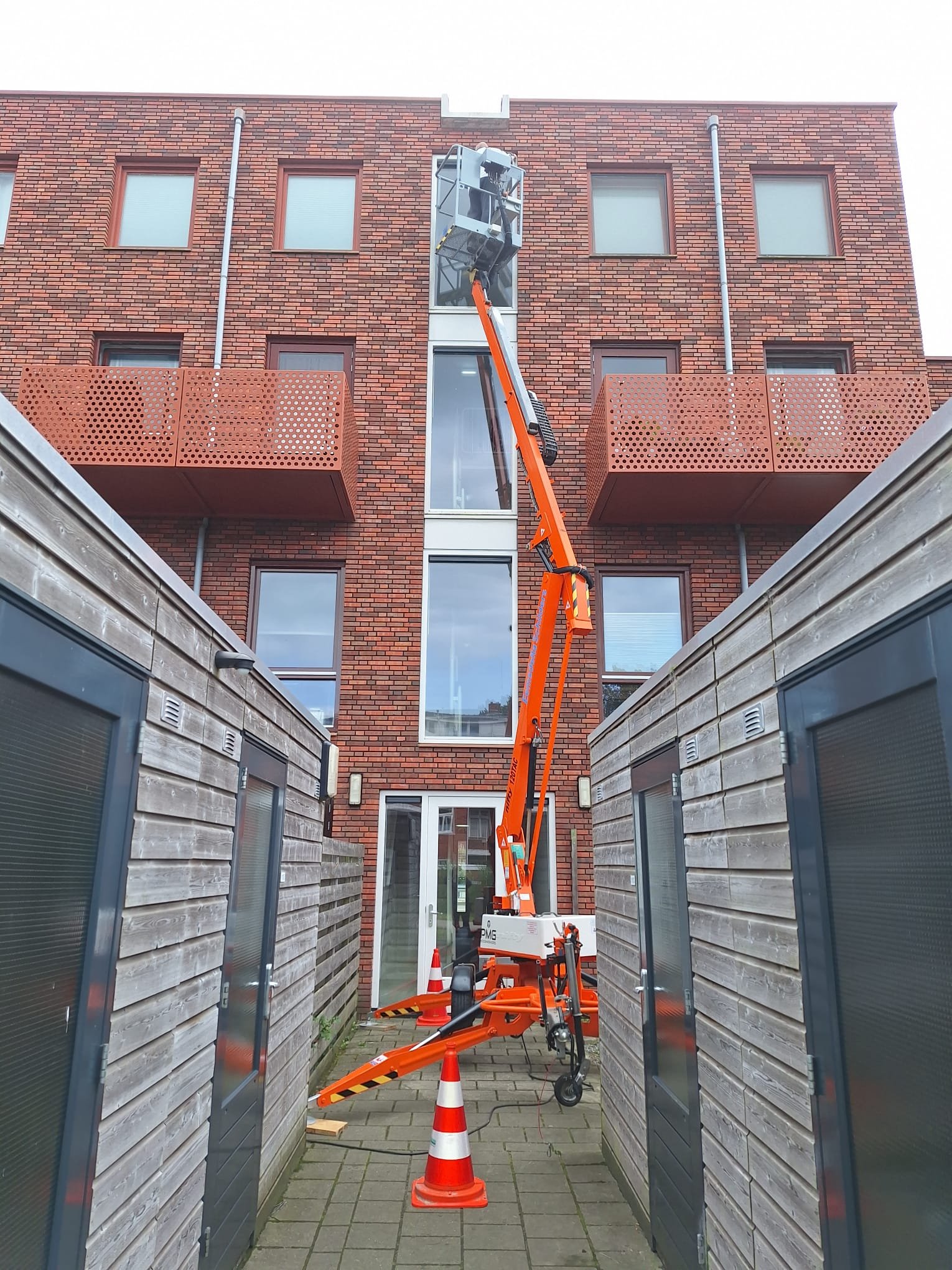 Hoogwerker schilderwerk